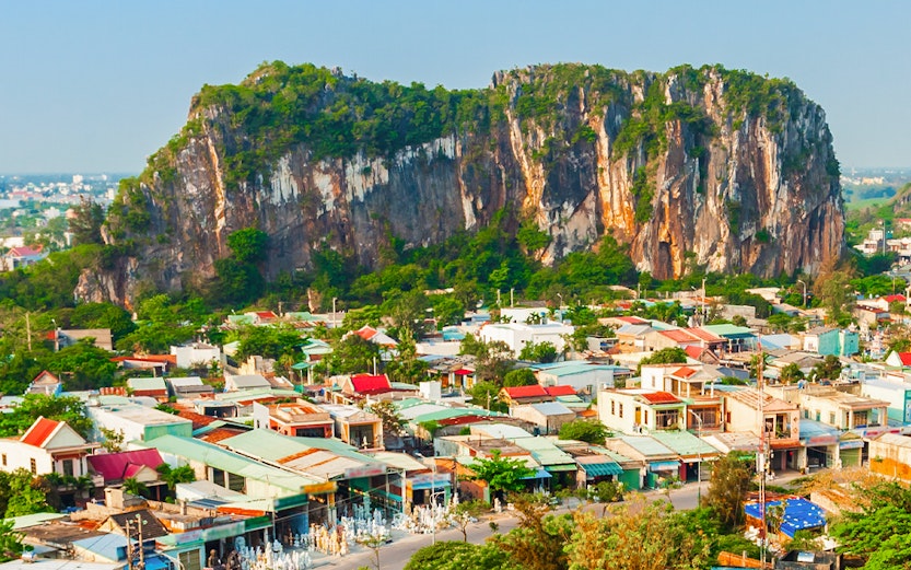 Aerial view of Marble Mountains and surrounding town in Da Nang, Vietnam.
