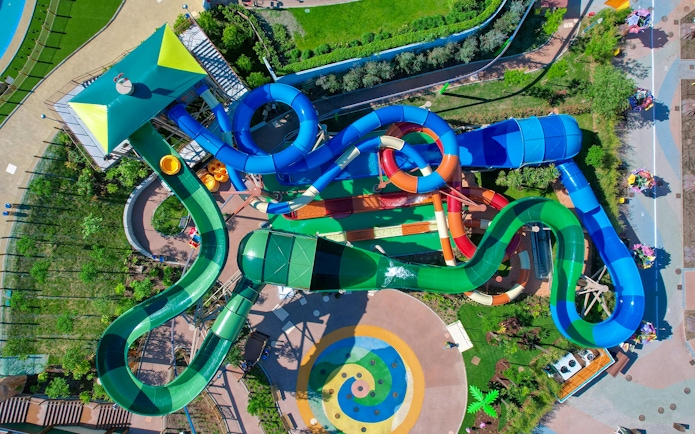 Aerial view of colorful water slides at Legoland Waterpark in Gardaland.