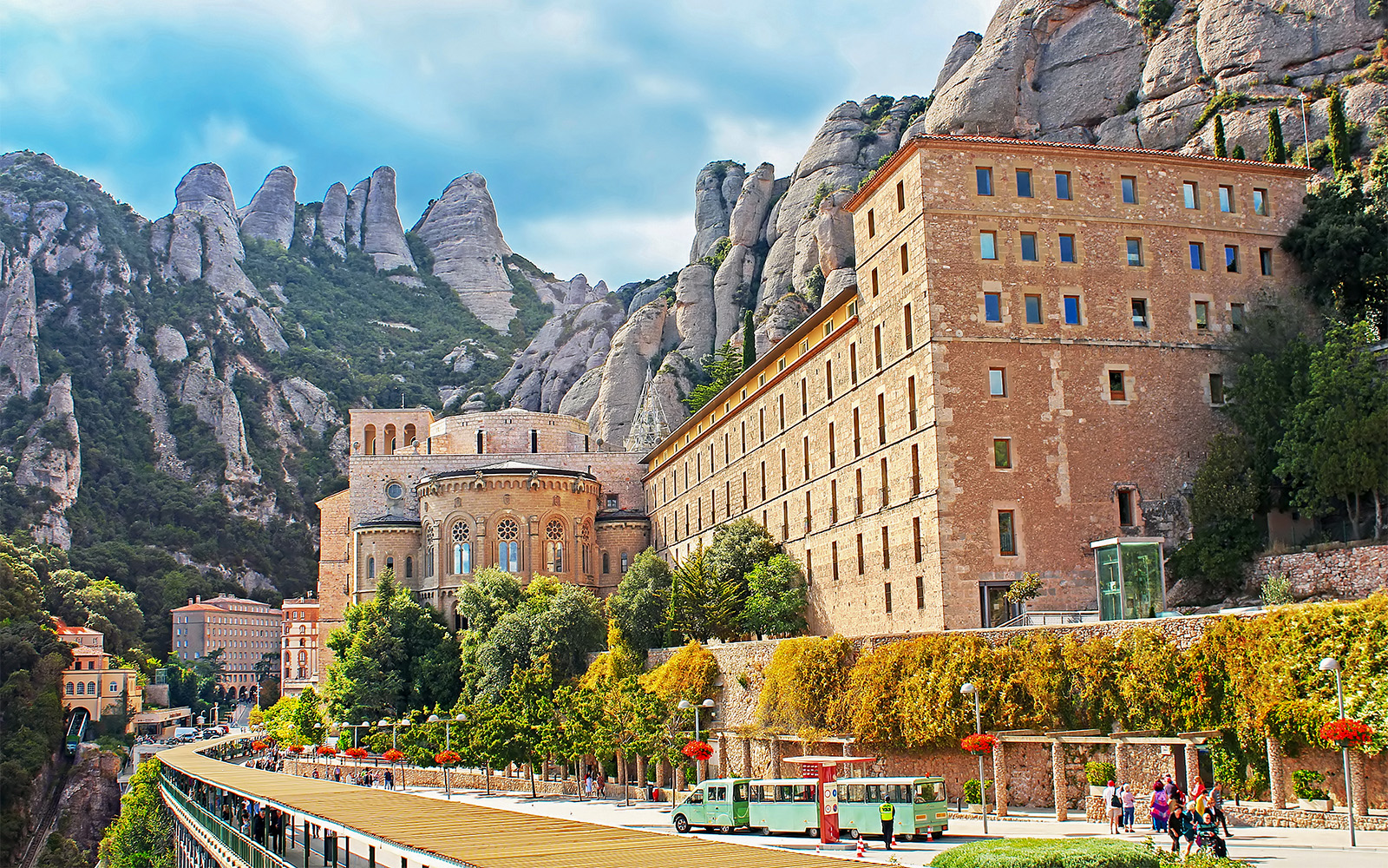 Montserrat Monastery in Catalonia, Spain, nestled in rugged mountain landscape.