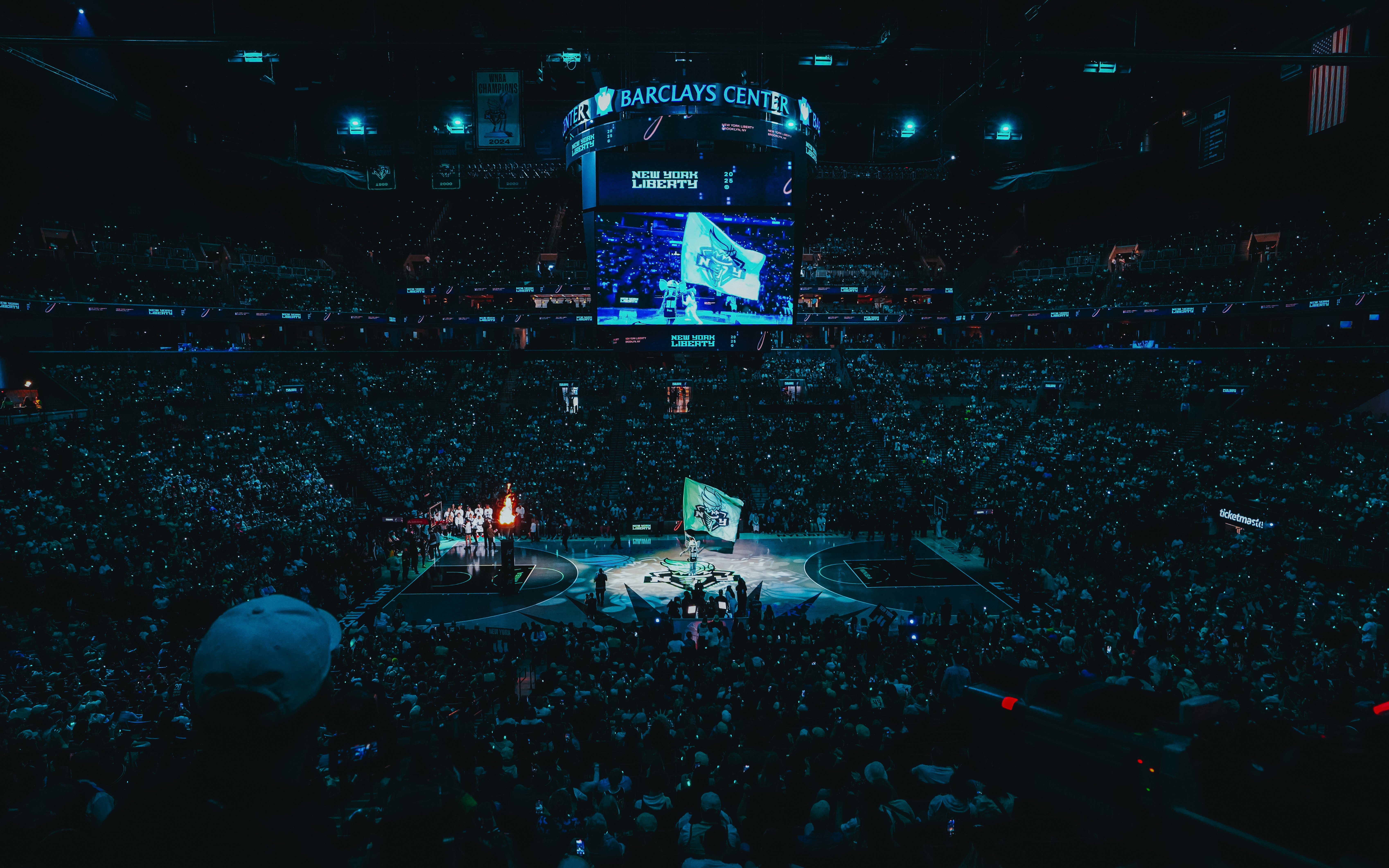 Aerial night view of New York Liberty basketball game at Barclays Center.
