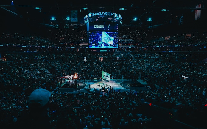 Aerial night view of New York Liberty basketball game at Barclays Center.