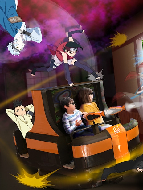 Visitors on an interactive ride at FujiQ Highland Park, Tokyo, with anime characters.