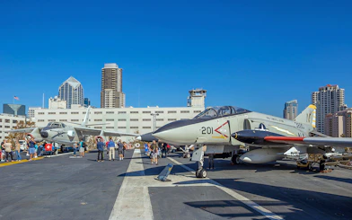 USS Midway aircraft carrier deck with historic fighter jets in San Diego.