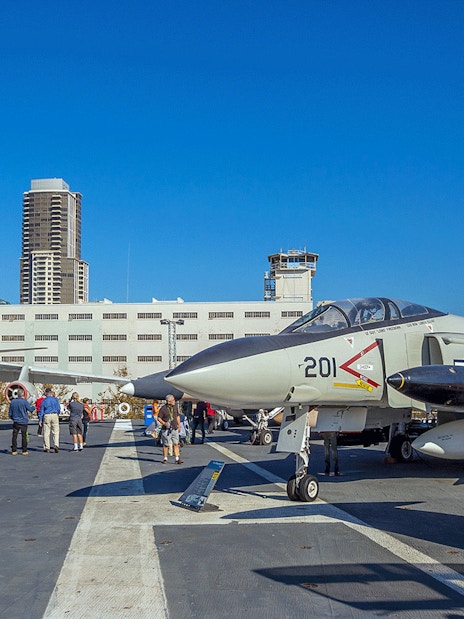 USS Midway aircraft carrier deck with historic fighter jets in San Diego.