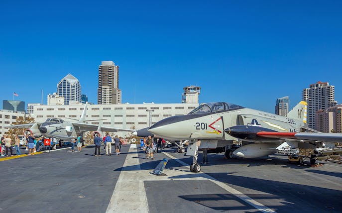 USS Midway aircraft carrier deck with historic fighter jets in San Diego.