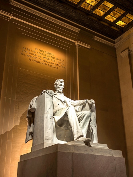 Lincoln Memorial statue illuminated at night in Washington D.C.