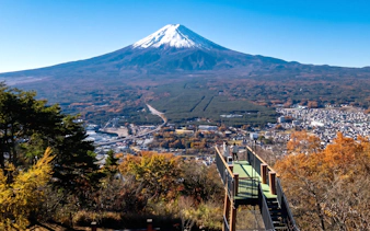 Kawaguchiko Ropeway view of Mount Fuji and autumn foliage in Oishi Park, Japan.