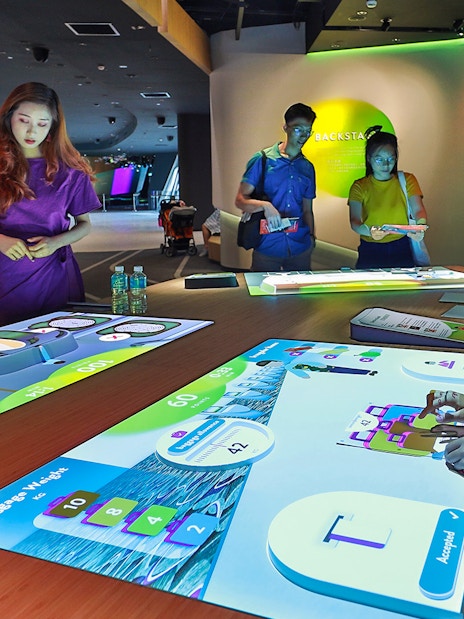 Visitors interacting with digital exhibits at Petrosains, The Discovery Center.