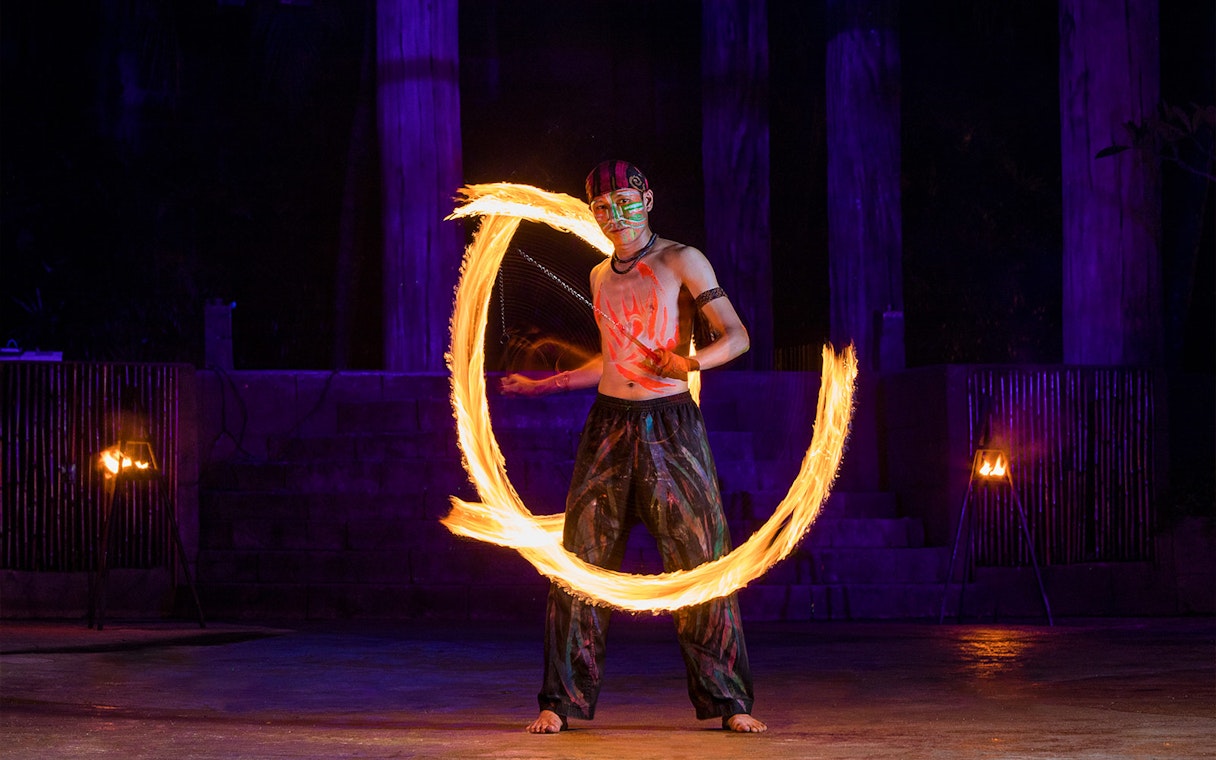 Fire performer at Sunway Lost World Hot Springs Night Park.