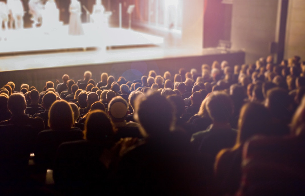 Audience watching a film at the Kraków Film Festival.