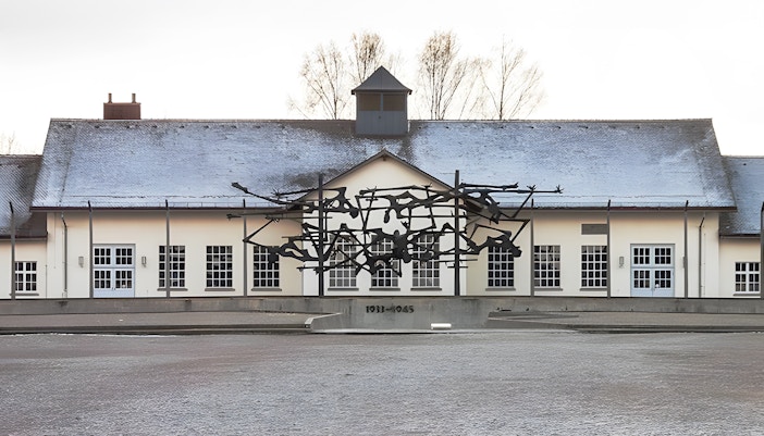 Dachau Concentration Camp Memorial Site entrance with historical buildings in Munich, Germany.