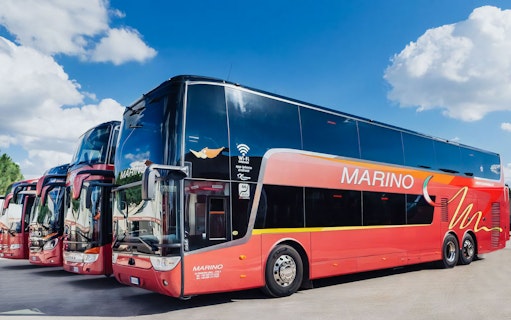 MarinoBus coaches parked, offering one-way tickets between Naples Metropark and Rome Tiburtina.