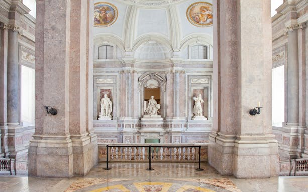 Sculptures in the grand hall of the Royal Palace of Caserta, Italy.