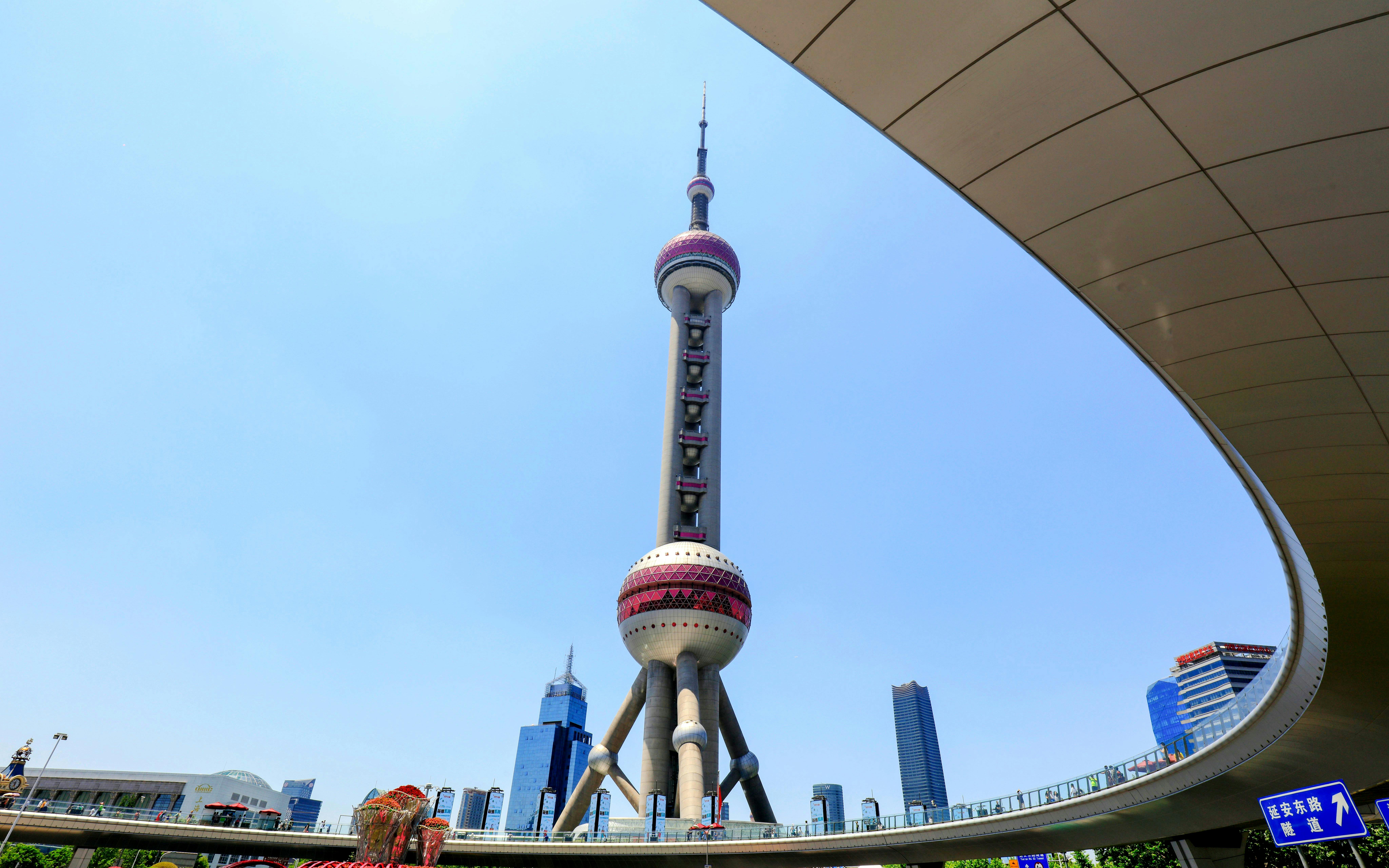 Oriental Pearl TV Tower in Shanghai, China with city skyline in the background.