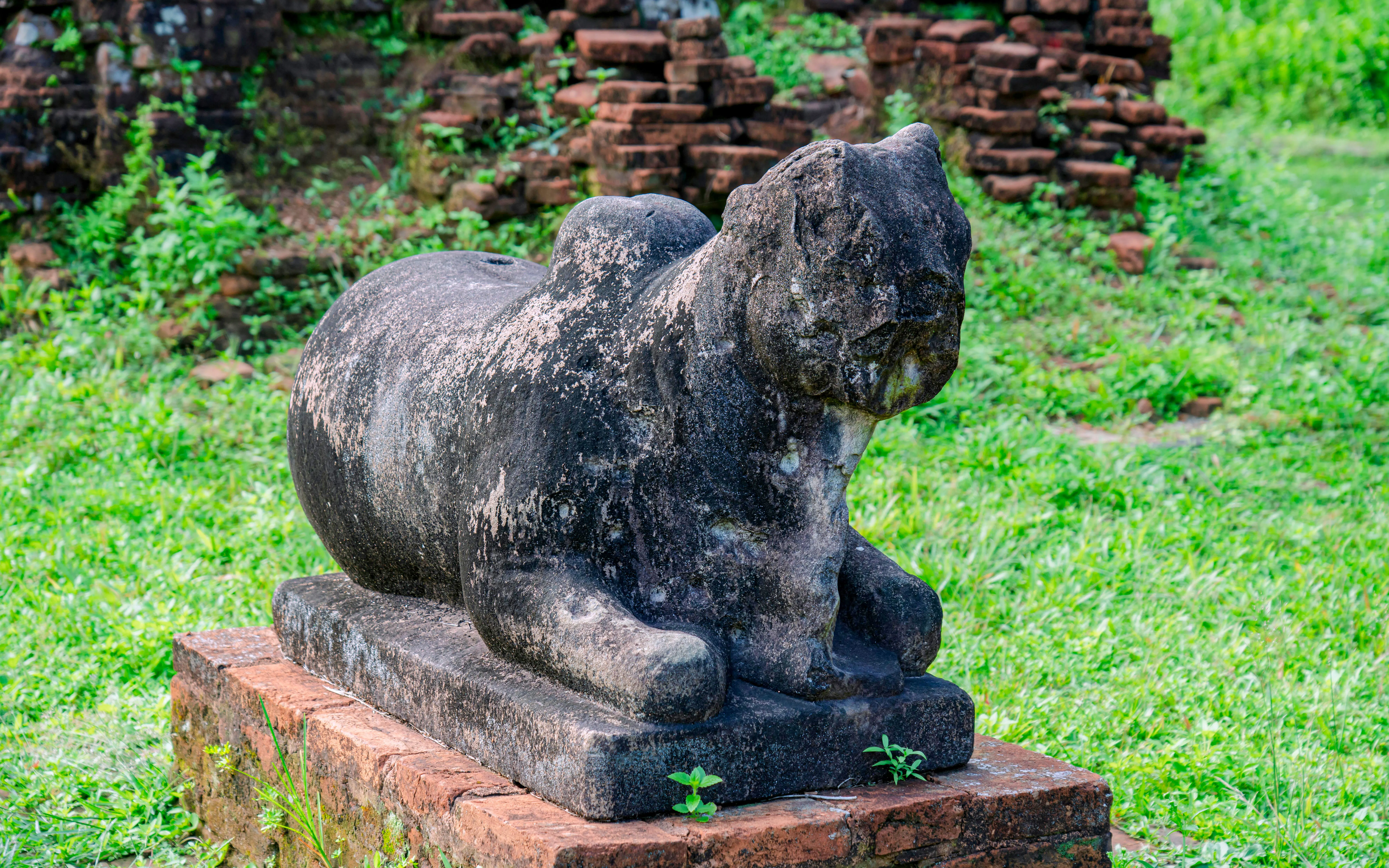 Stone guardian animal sculpture at My Son Sanctuary, Vietnam.