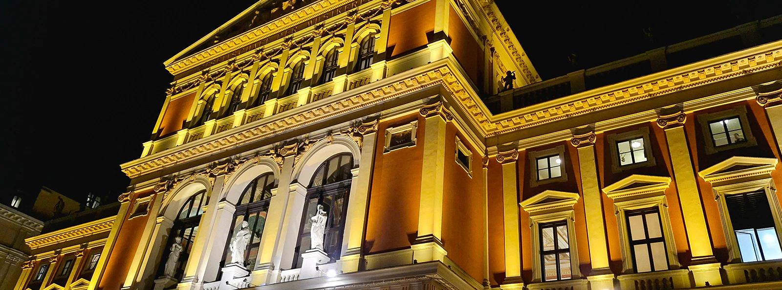 Musikverein concert hall illuminated at night, Vienna, Austria.