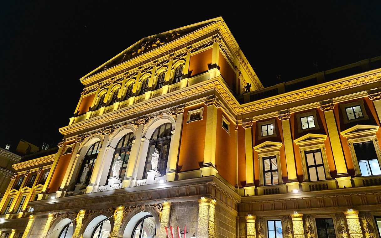 Musikverein concert hall illuminated at night, Vienna, Austria.