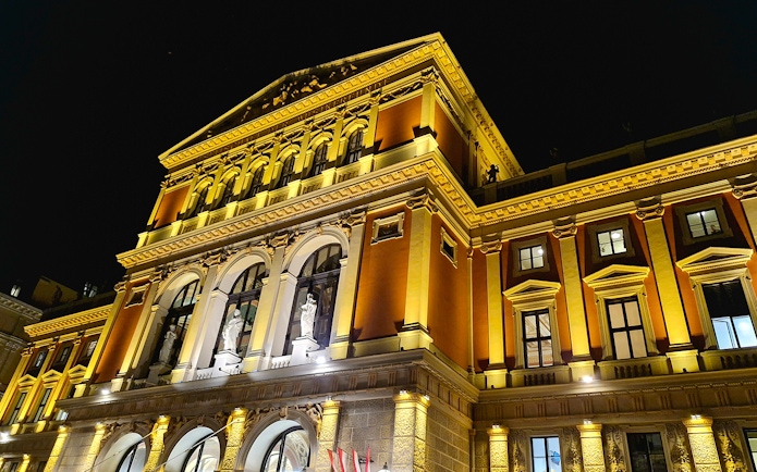 Musikverein concert hall illuminated at night, Vienna, Austria.