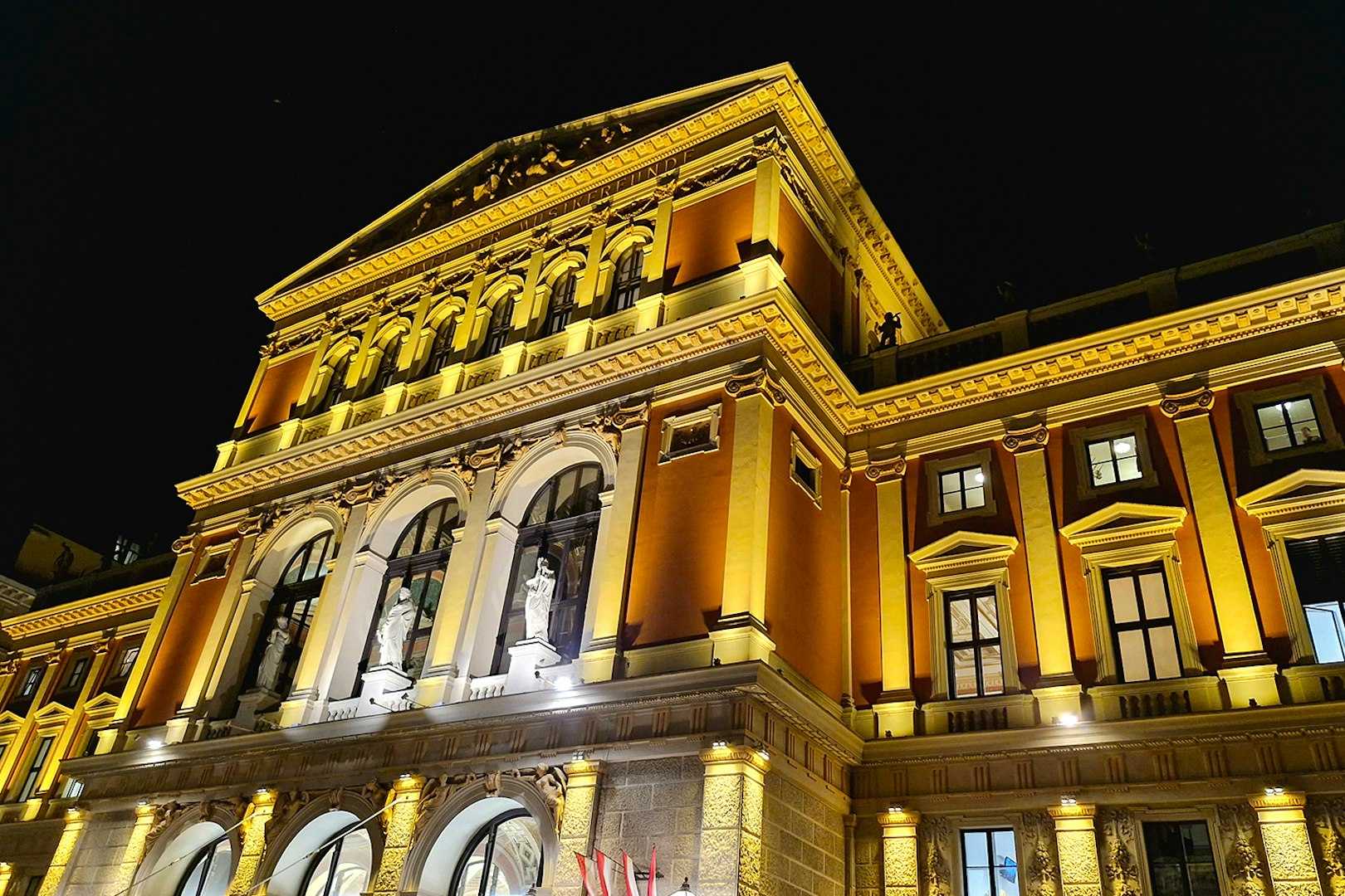Musikverein concert hall illuminated at night, Vienna, Austria.