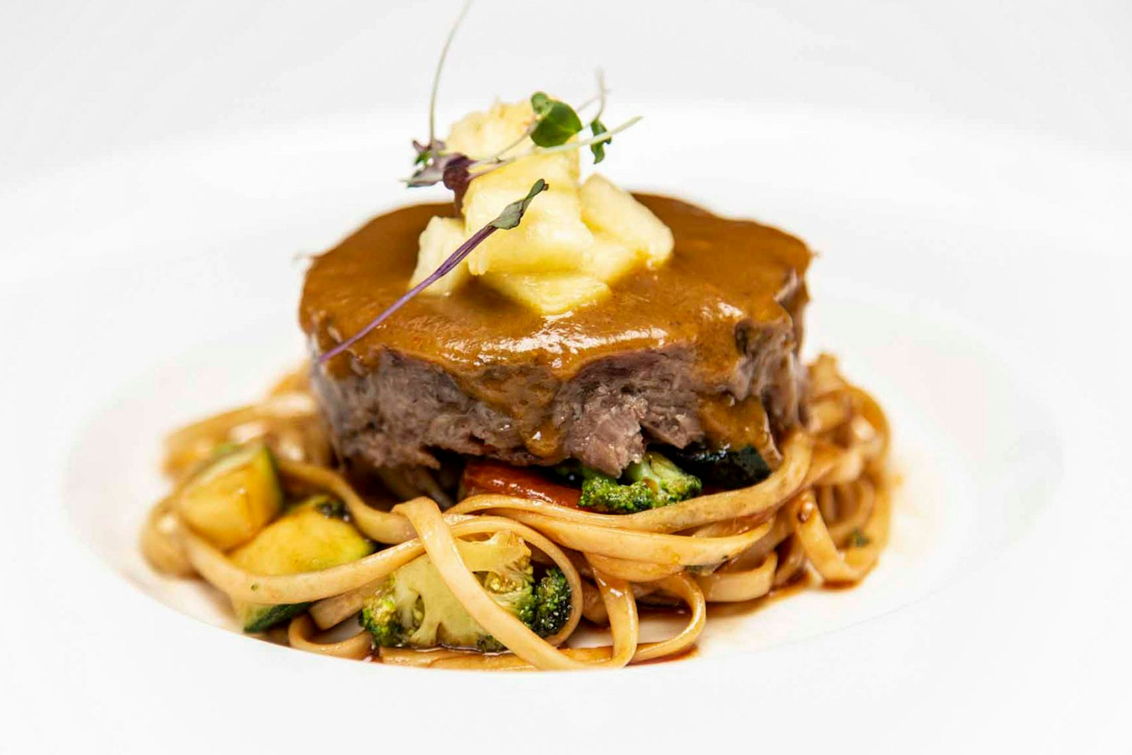 La carte dinner with beef and pasta at Tablao El Arenal.