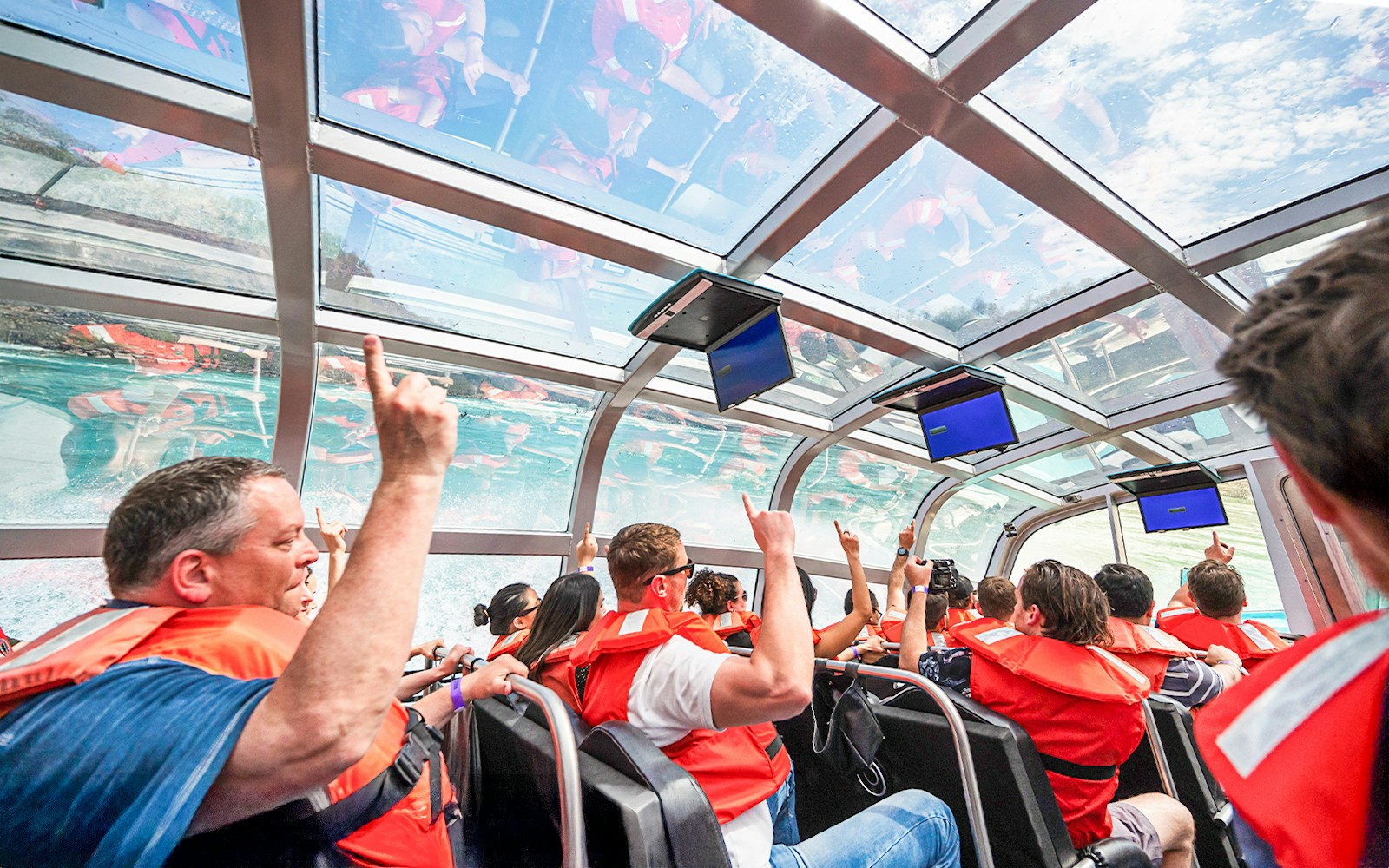 Guests on the Freedom jet boat tour in for a fun experience in the Niagara RIver Gorge in Niagara, Canada