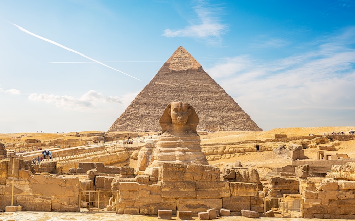 Sphinx and Pyramid of Giza on a sunny day, part of Cairo's private half-day tour.
