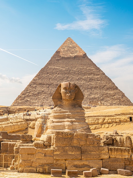 Sphinx and Pyramid of Giza on a sunny day, part of Cairo's private half-day tour.