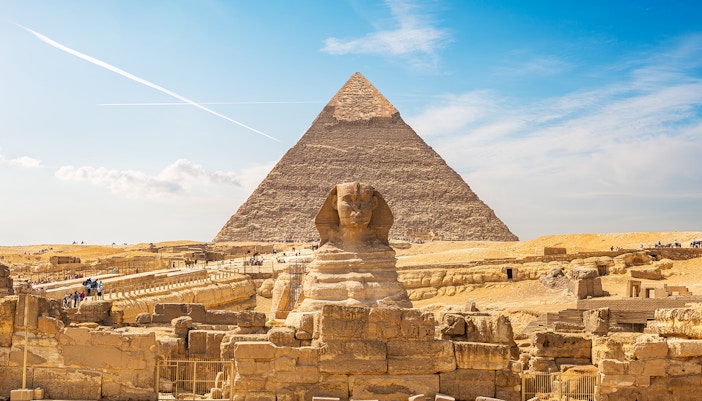 Sphinx and Pyramid of Giza on a sunny day, part of Cairo's private half-day tour.