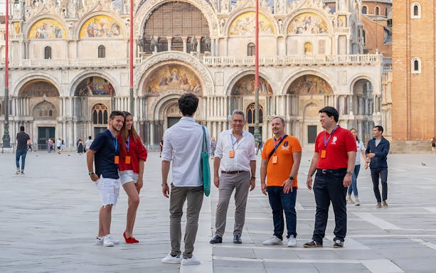 Tour group in front of St. Mark's Basilica, Venice, during Doge's Palace & Bell Tower climb.