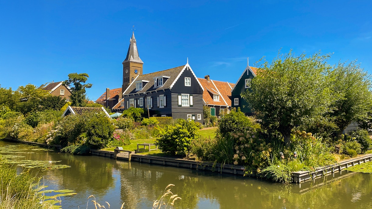 Historic village of Marken with canal and traditional Dutch houses, North Holland, Netherlands.