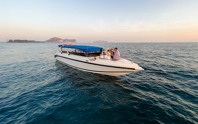 Speedboat with tourists on Phi Phi Islands tour from Phuket.