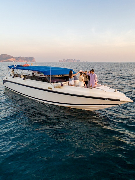 Speedboat with tourists on Phi Phi Islands tour from Phuket.