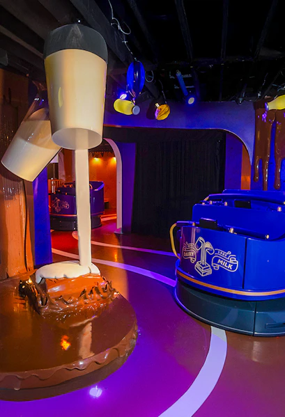 Cadbury World interior with chocolate-making exhibit in Birmingham, UK.