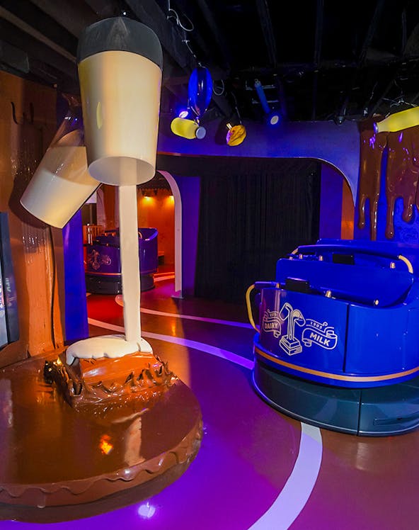 Cadbury World interior with chocolate-making exhibit in Birmingham, UK.