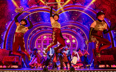 Performers on stage during Moulin Rouge! The Musical in London's West End.