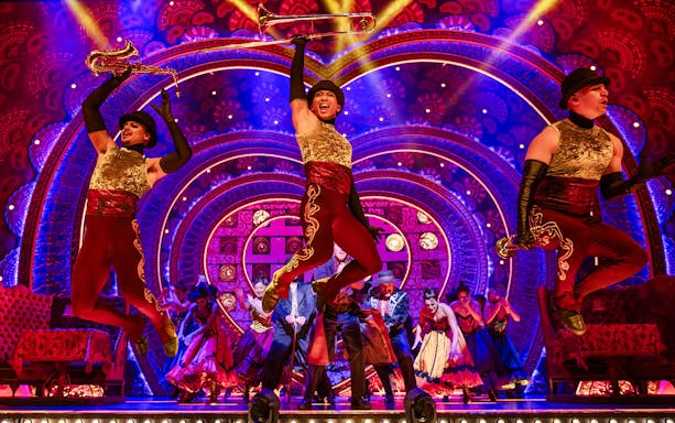 Performers on stage during Moulin Rouge! The Musical in London's West End.