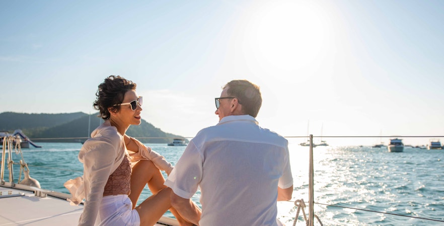 Couple enjoying a sunny day on a yacht in the Bosphorus, Istanbul.