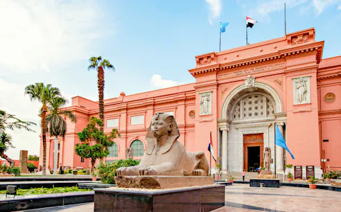 Egyptian Museum entrance with sphinx statue, Cairo, part of the Giza historical tour.