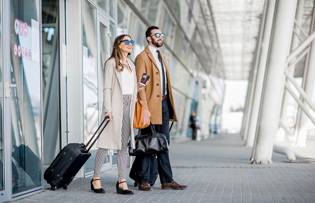 Airport terminal with travelers