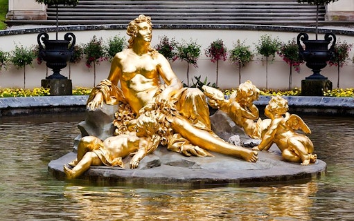 Golden statue in the fountain at Linderhof Palace, Germany.