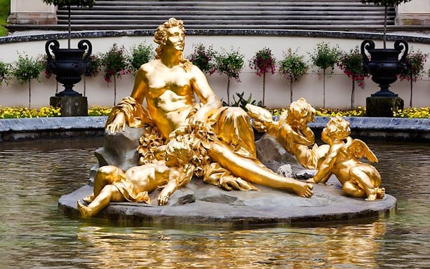 Golden statue in the fountain at Linderhof Palace, Germany.