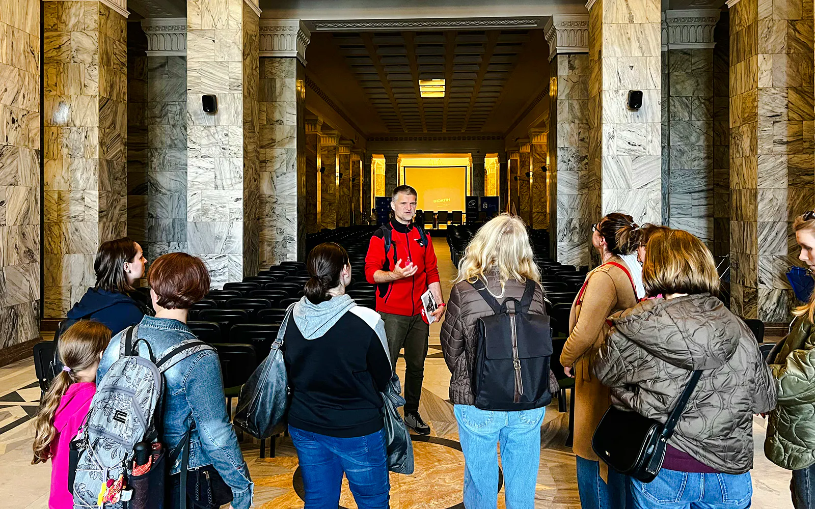 Guided tour group inside the Palace of Culture and Science, Warsaw.
