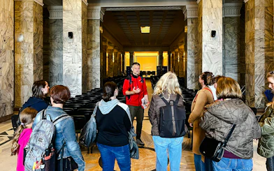 Guided tour group inside the Palace of Culture and Science, Warsaw.