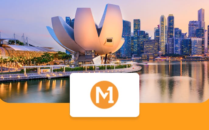 Singapore skyline with Marina Bay Sands and M1 logo, promoting 4G M1 Tourist SIM Card.