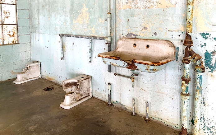 Alcatraz prison cell sink and toilet, part of San Francisco Bay cruise tour.