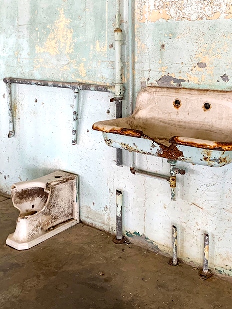 Alcatraz prison cell sink and toilet, part of San Francisco Bay cruise tour.