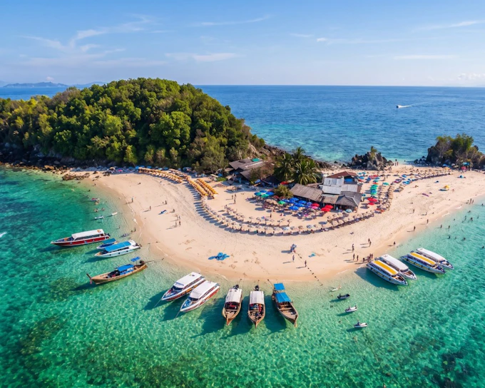 From Phuket: Phi Phi & Khai Islands Speedboat Tour with Snorkeling, Beachfront Lunch & Royal Phuket Marina Departure (Product 53788)