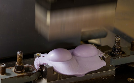 Perfume mold shaping lavender wax at Mini Perfume Workshop in Eze-Village.