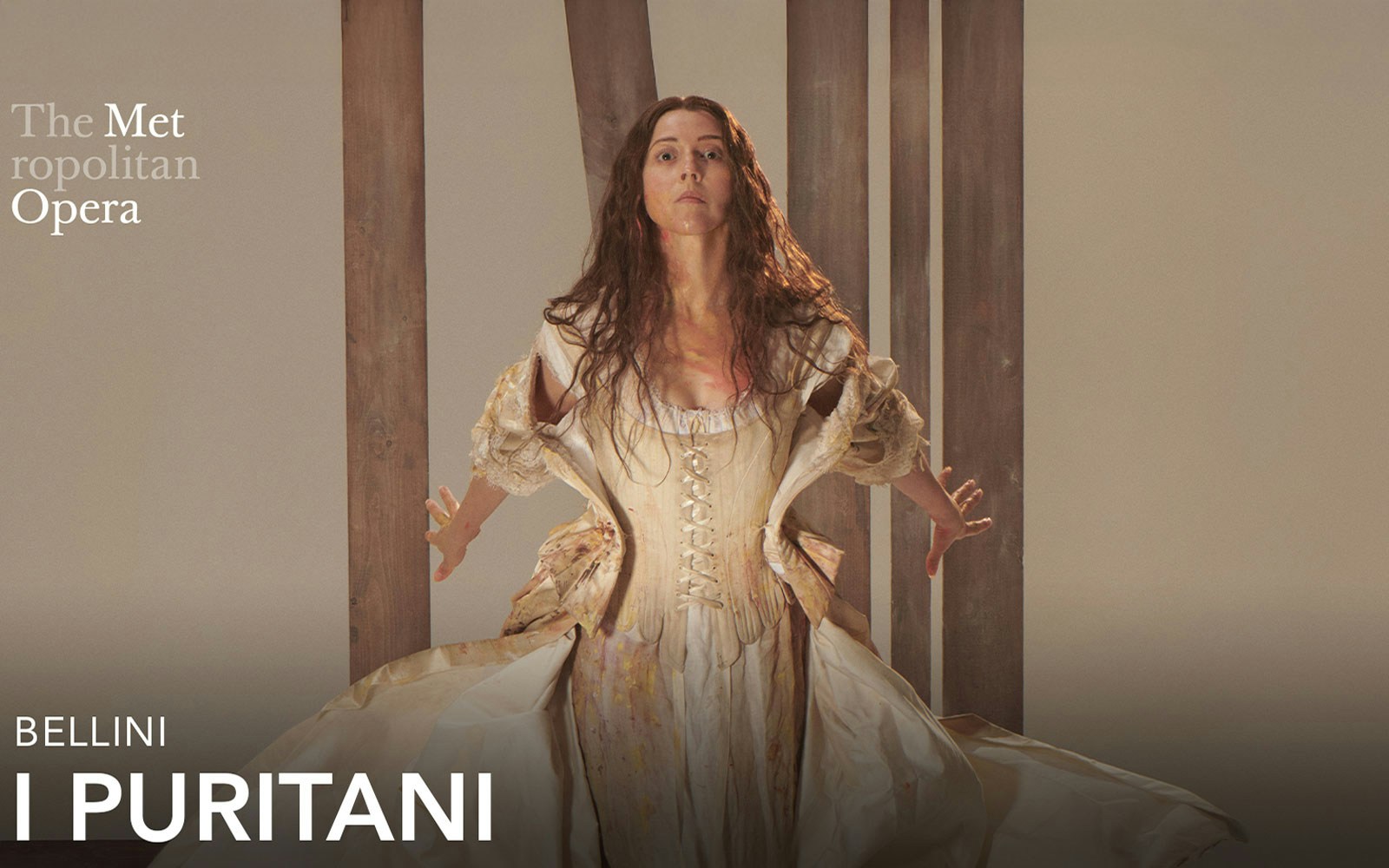 I Puritani opera poster at the Metropolitan Opera featuring a performer in period costume.
