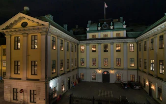 Stockholm building at night, part of the Secret Societies self-guided city exploration game.